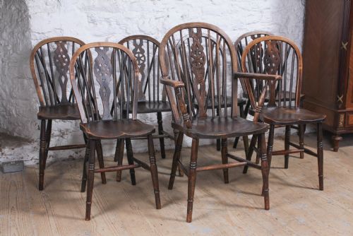 6 Windsor Wheel Back Chairs with Carver