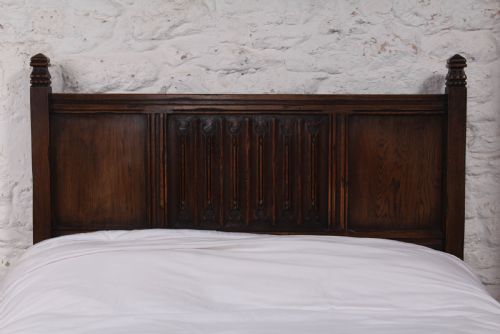 fig 1. Lovely  oak double bed with linen fold detail 