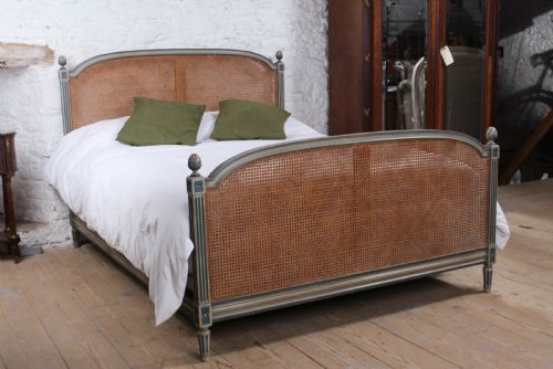 Attractive Caned King Size Bed with Fluted Posts