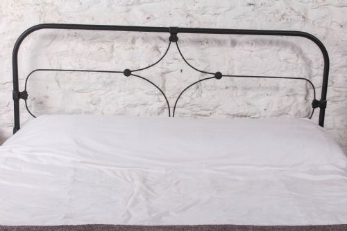 fig 1. Pleasingly simple Irish all iron king size bed