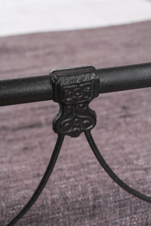 fig 3. Pleasingly simple Irish all iron king size bed