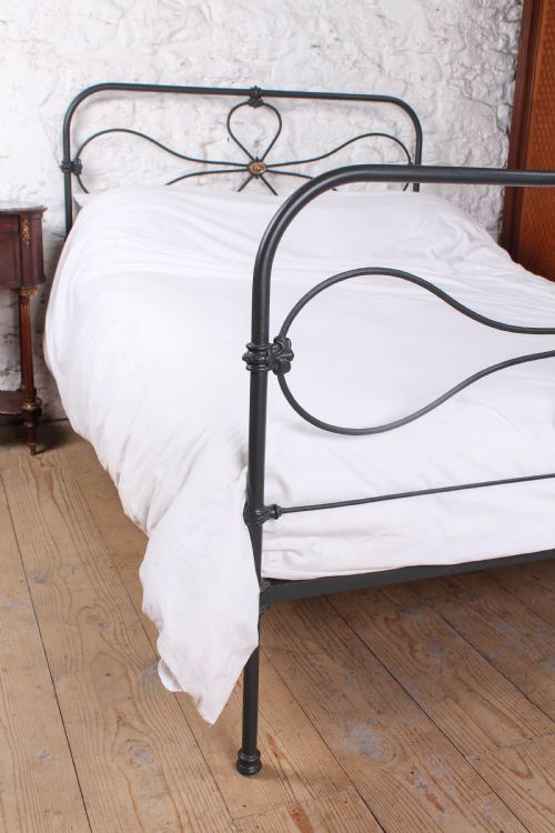 fig 4. Charming iron cottage style double bed