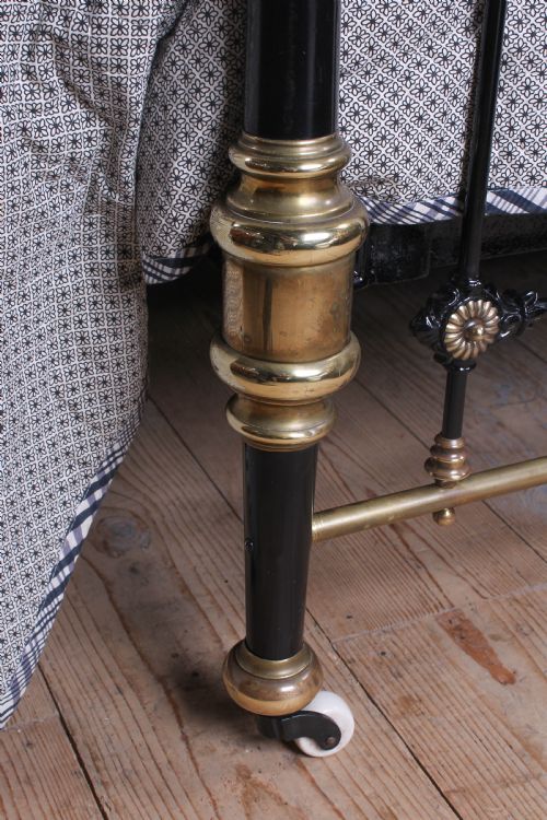 fig 3. Graceful individual Victorian black and brass king size bed