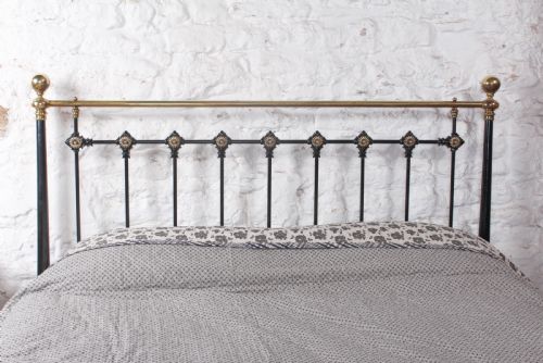 fig 4. Graceful individual Victorian black and brass king size bed