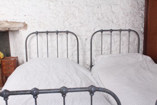 fig 3. Timeless Pair of Detailed Utilitarian Single Beds