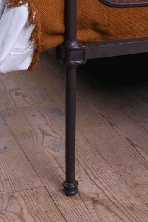 fig 3. Pleasingly simple all iron Irish king size bed