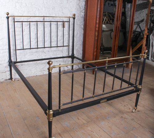 fig 1. Elegant king size brass and iron bed with taper posts 