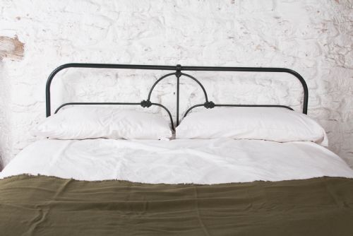 fig 1. Pleasingly simple Irish all iron king size bed
