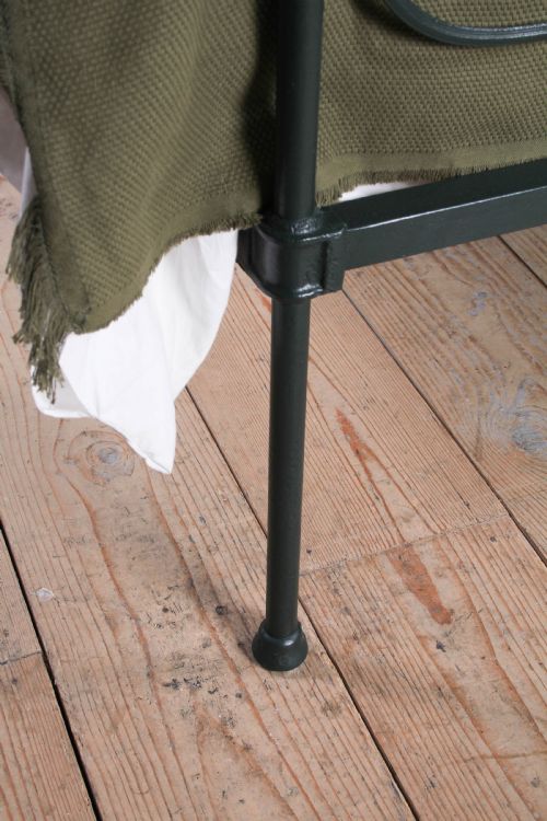 fig 3. Pleasingly simple Irish all iron king size bed