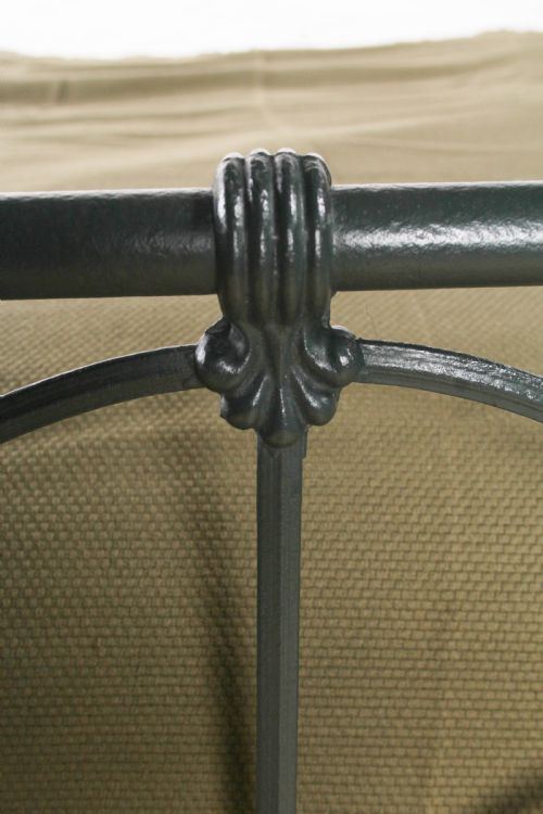 fig 4. Pleasingly simple Irish all iron king size bed