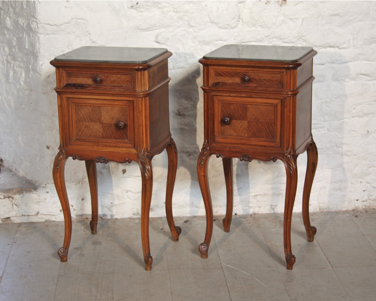 Pair of French walnut Louis XV1 bedsides with marble tops.