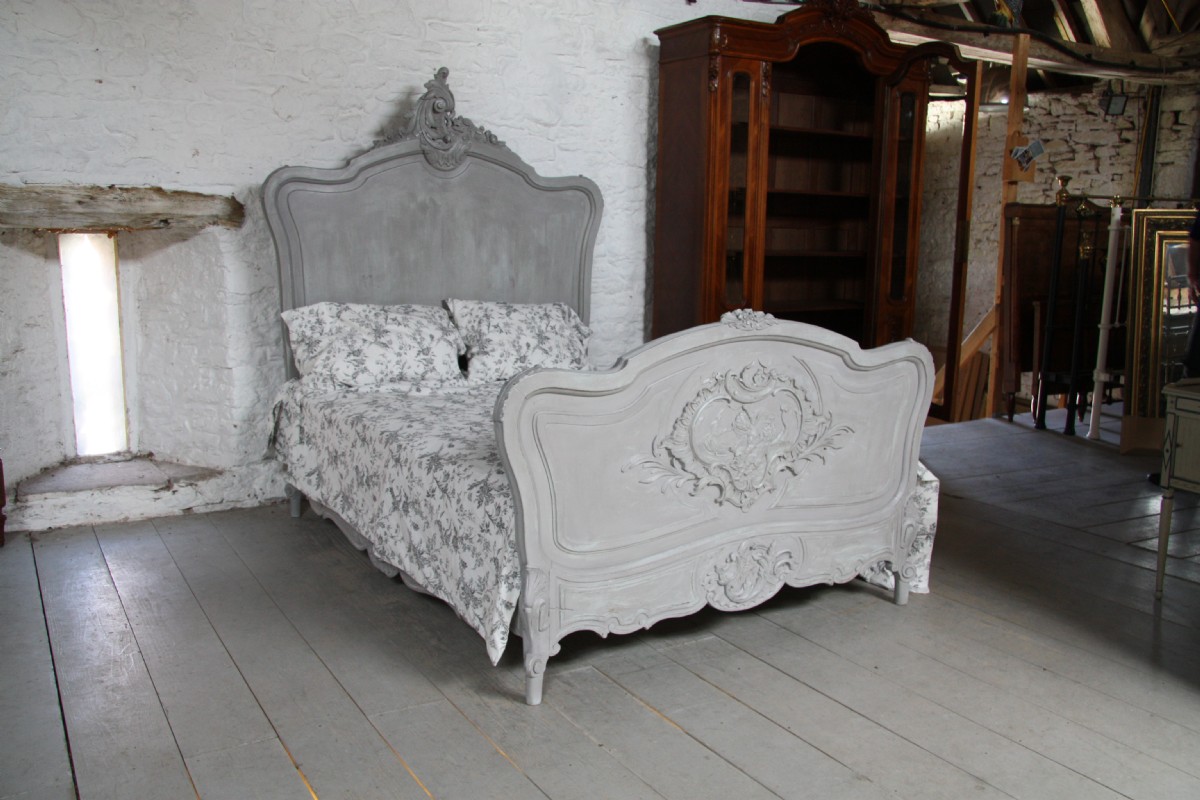 Elaborate carved French Louis XV with cherubs painted in aged French grey