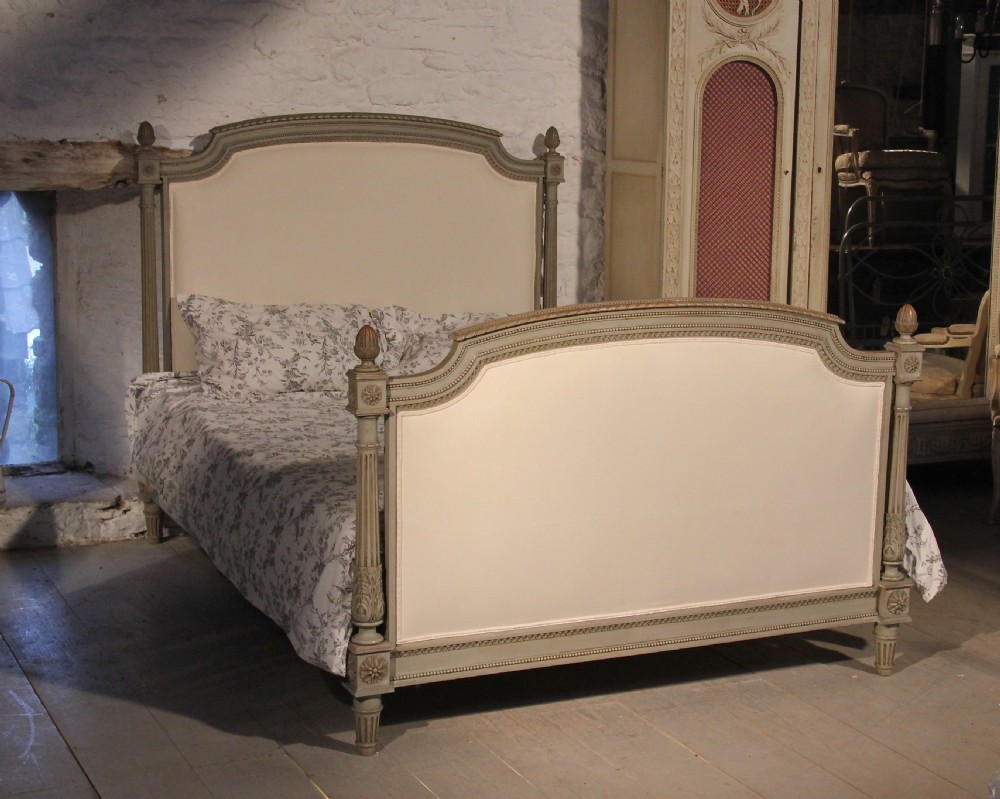 Newly upholstered French Louis XV1 kingsize bed with original paint finish
