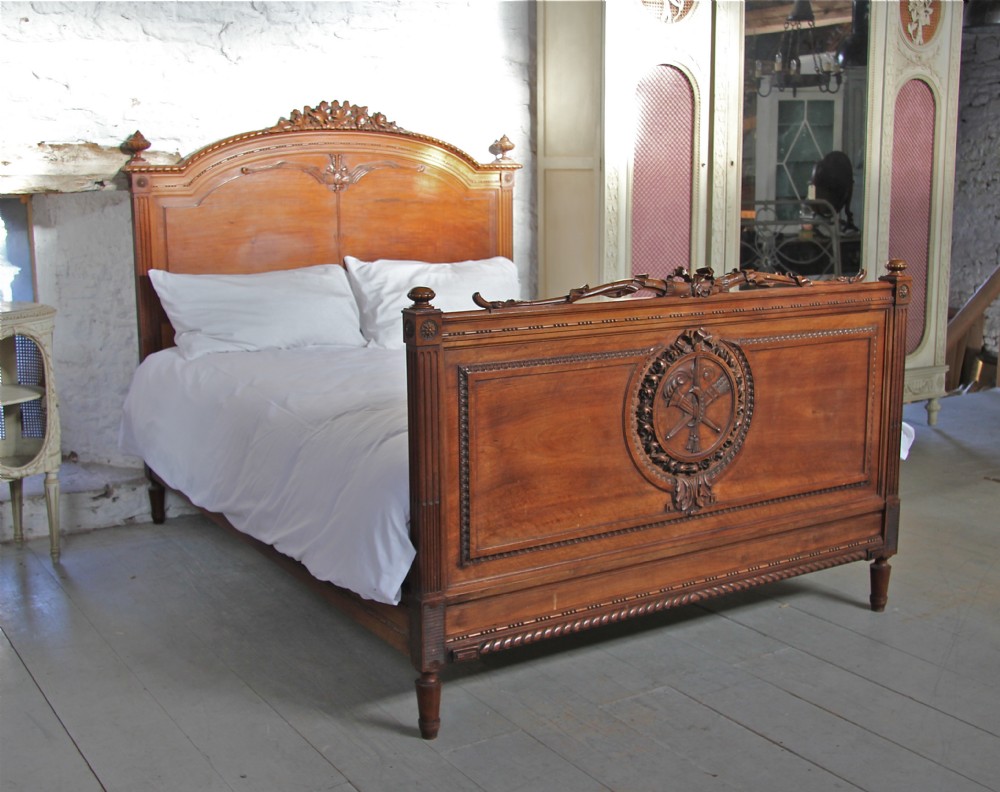 Unusual French solid walnut carved king size bed