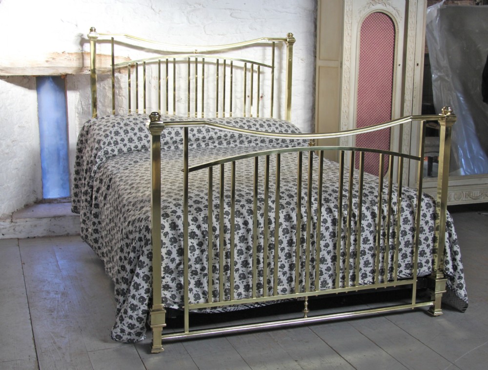 Unusual polished and lacquered solid brass king size French bed