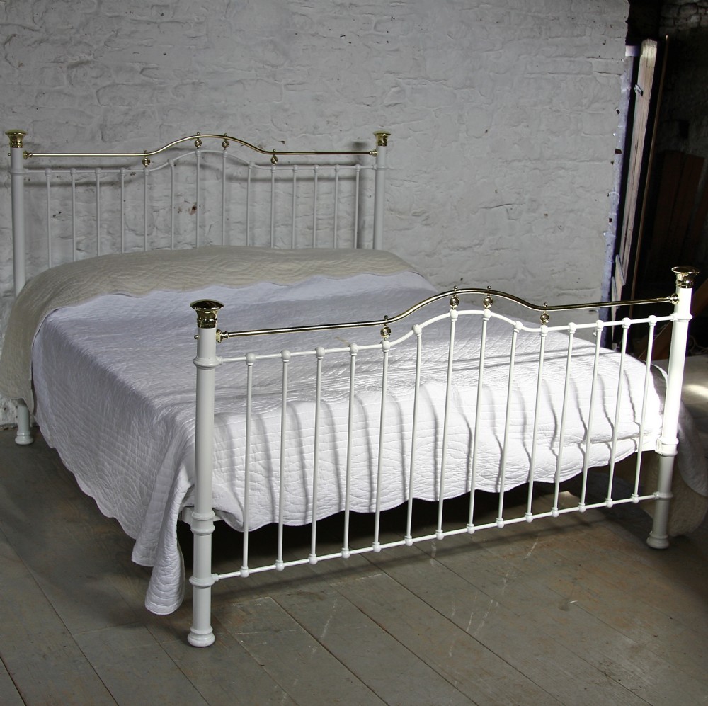 Six foot wide classic Victorian white and brass bed