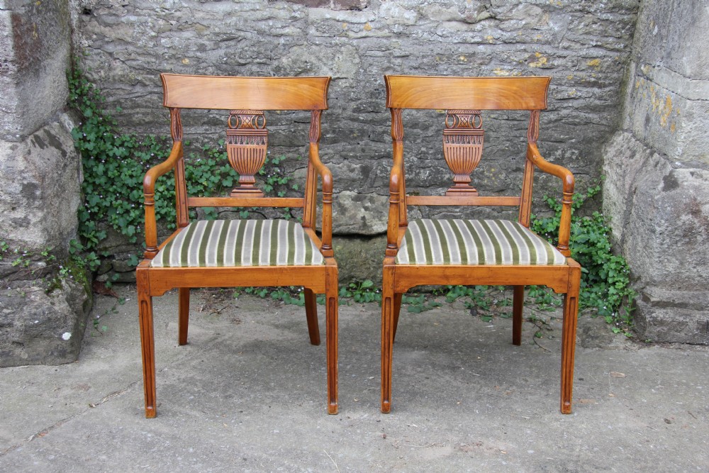 Pair of French carved cherry upholstered chairs