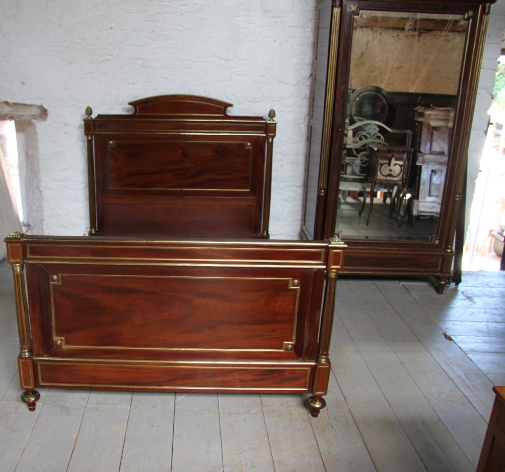 Napoleon 11 mahogany with brass inlay double bed and armoire.
