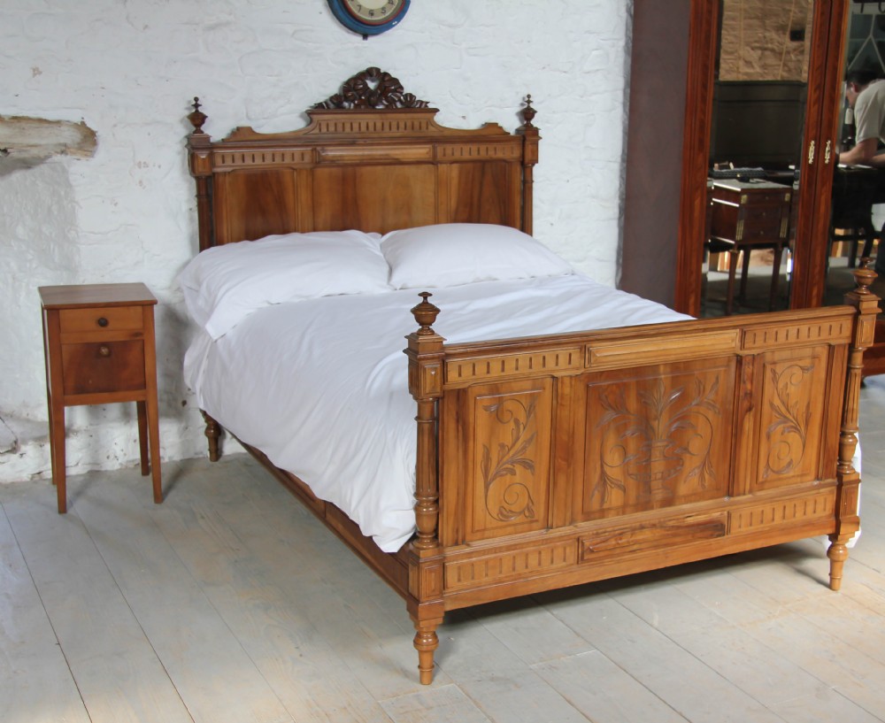 Lovely light walnut Henri 11 style double bed