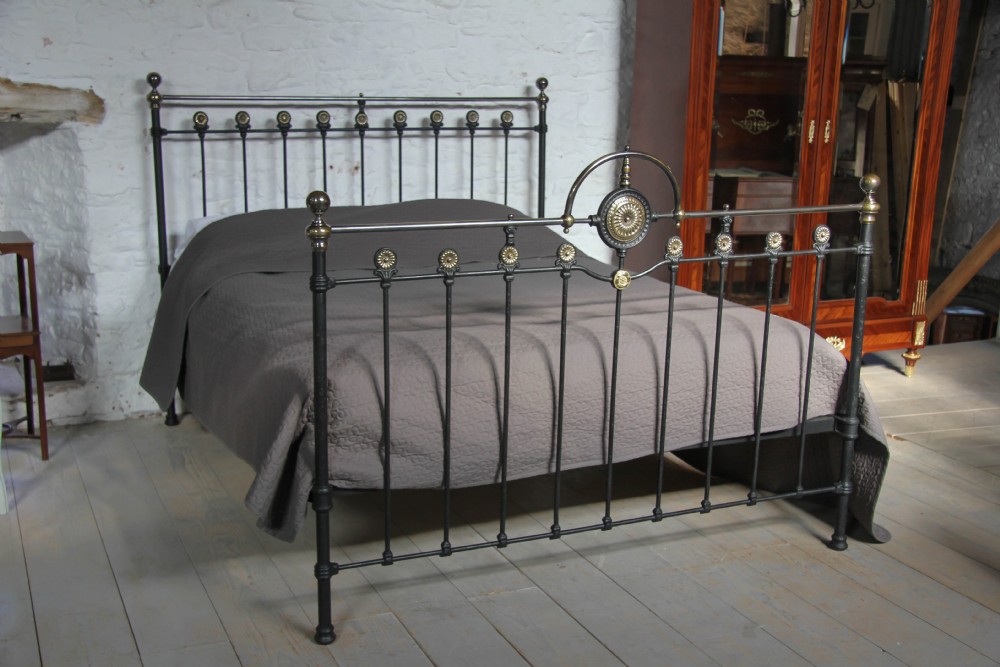 Handsome large king size black and brass Victorian 