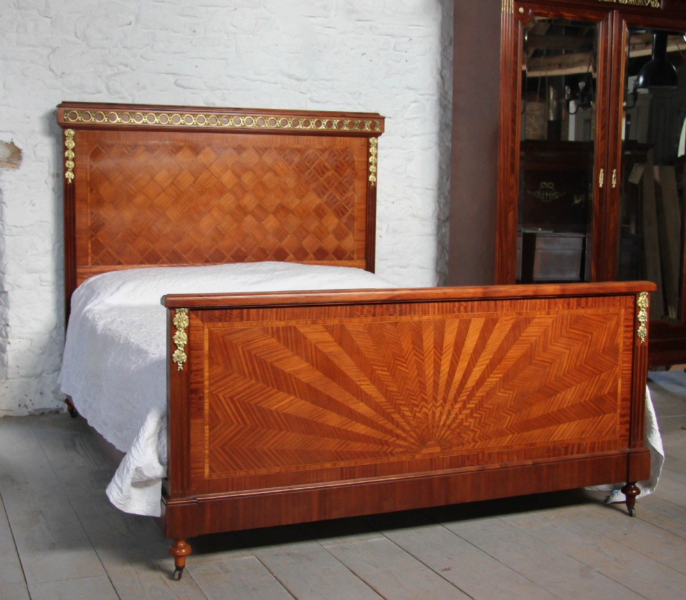 Handsome French with parquetry head and sunburst foot.