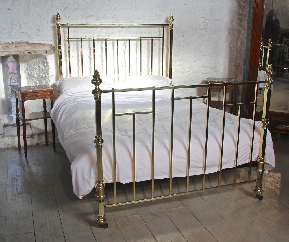 Polished and lacquered king size all original Edwardian brass bed