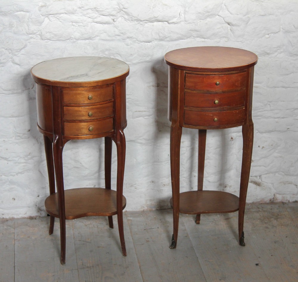 Harlequin pair of oval French  walnut bedsides with drawers