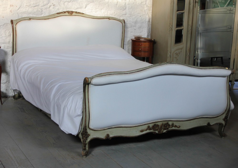 French Louis XV newly upholstered to calico king size bed