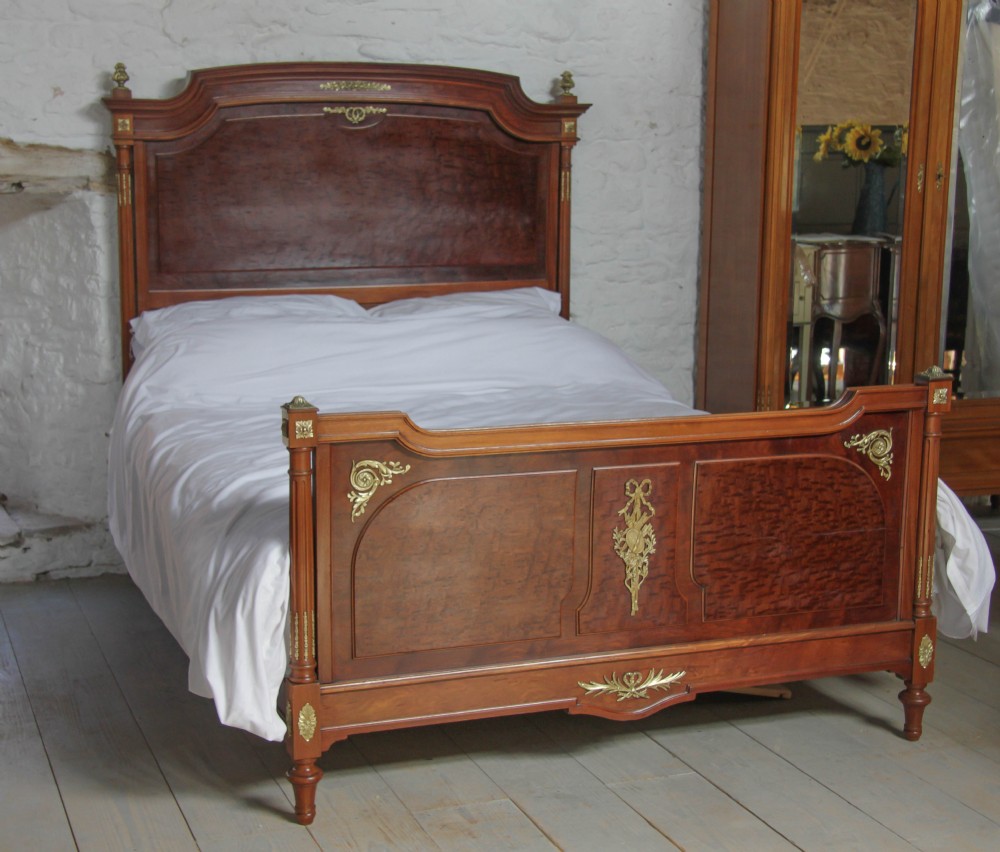Mahogany and burr walnut French bed with ormalu decoaration suitable for kingsize