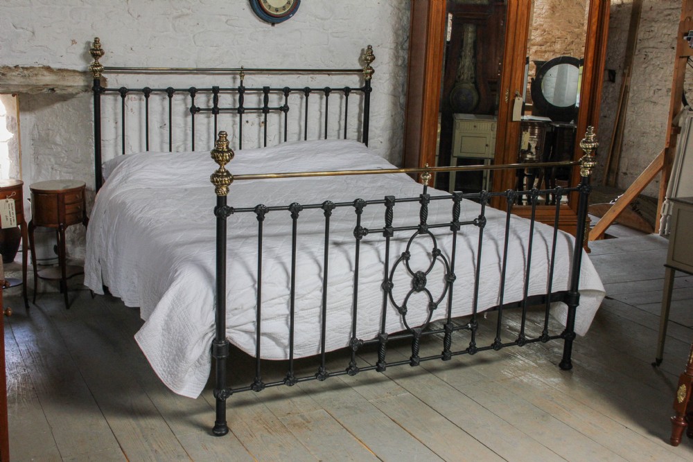 Handsome superkingsize classic black and original brass Victorian