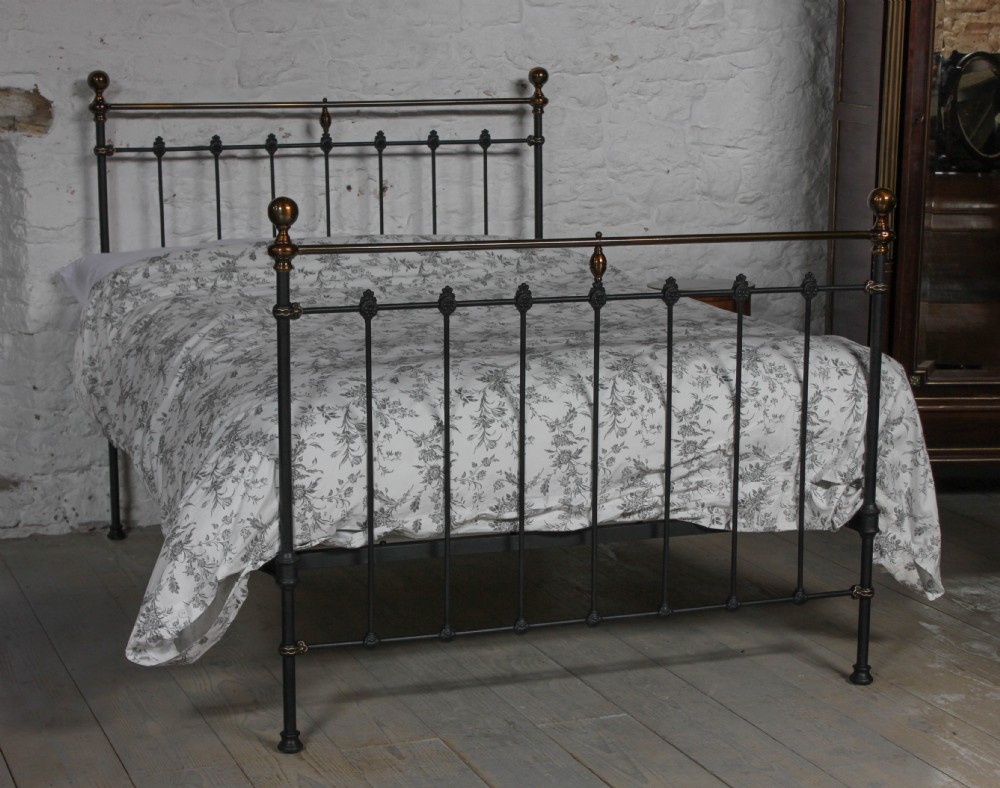 Classic Victorian warm aged brass and black double bedstead