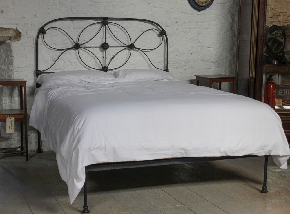 Attractive hand finished king size Irish  no end all iron bed.