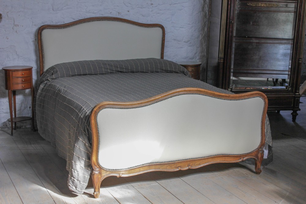 Newly upholstered French  walnut frame king size
