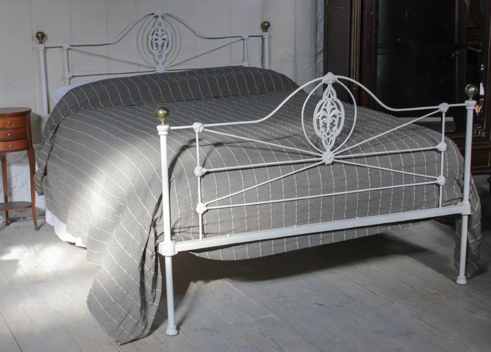 Pretty aged white Victorian king size iron 