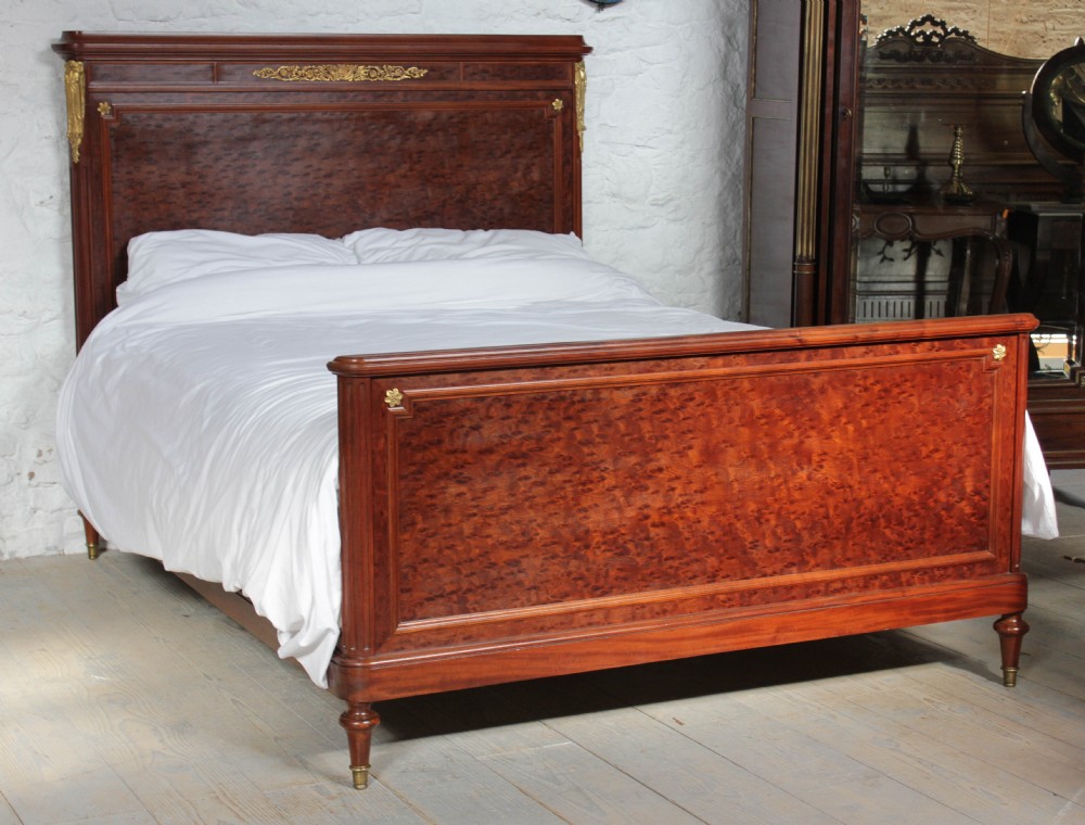 Handsome Empire style burr walnut king size