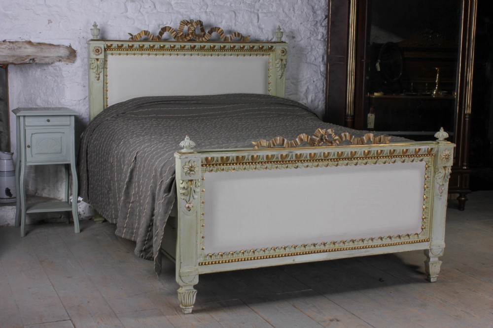 Striking carved, gilded French upholstered king size