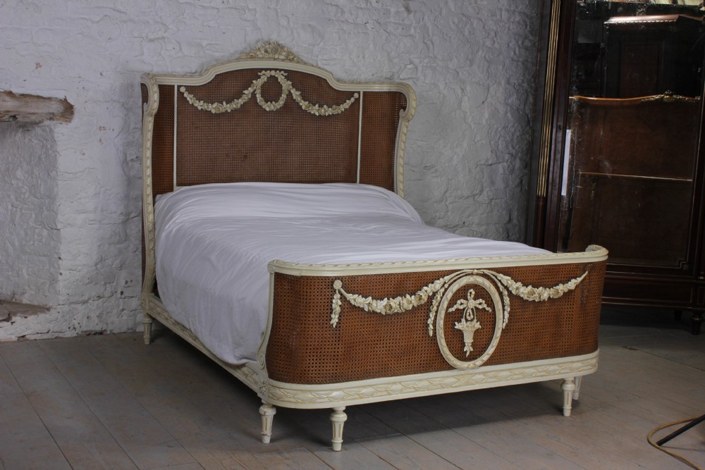 French carved and caned bergere corbeille king size