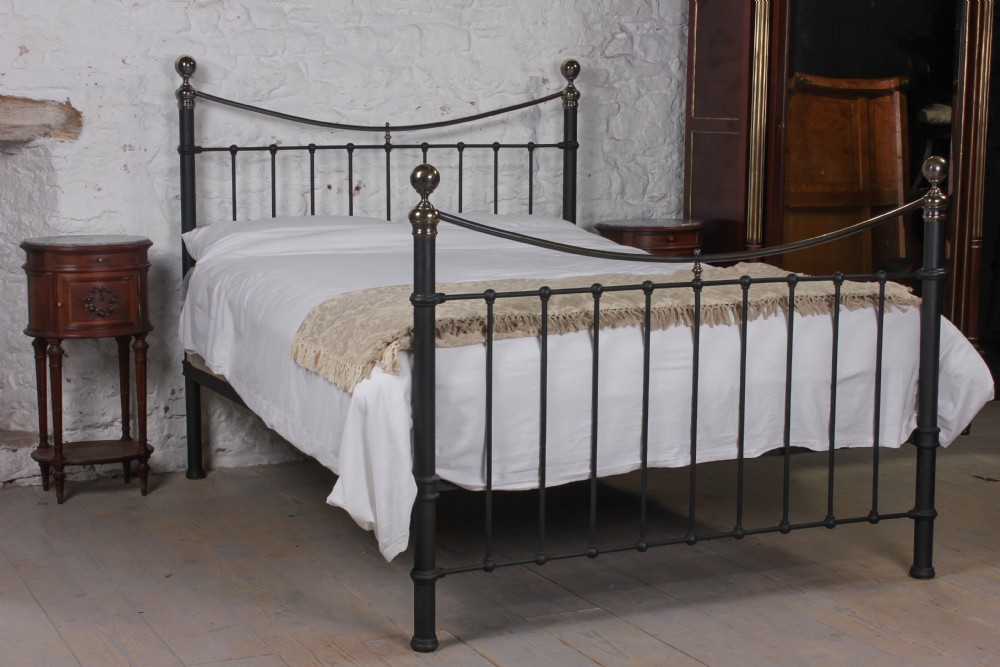 Classic aged black and brass Victorian dip rail