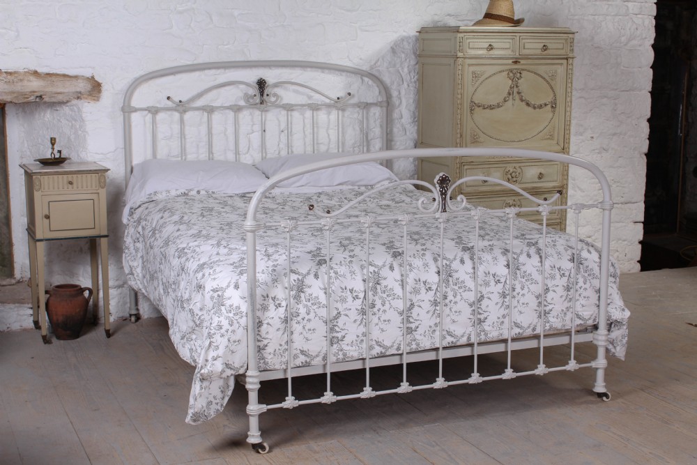 Gorgeous French king size bed with brass detail