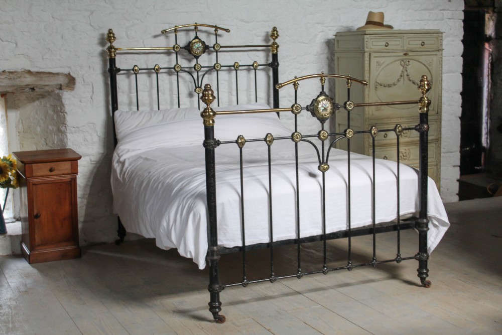 All original classic Victorian bed with mother of pearl detail