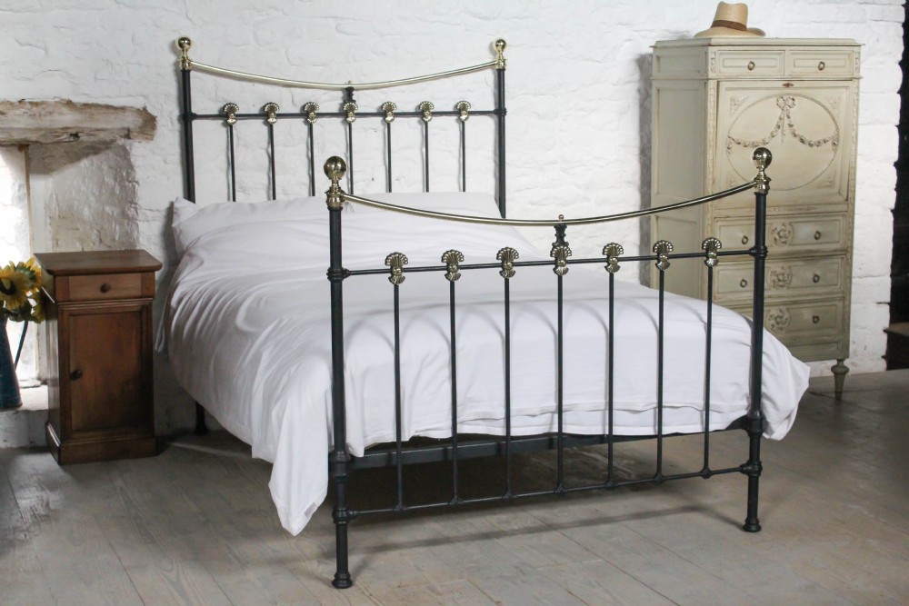 Classic Victorian Dip rail with lovely original brass decoration.