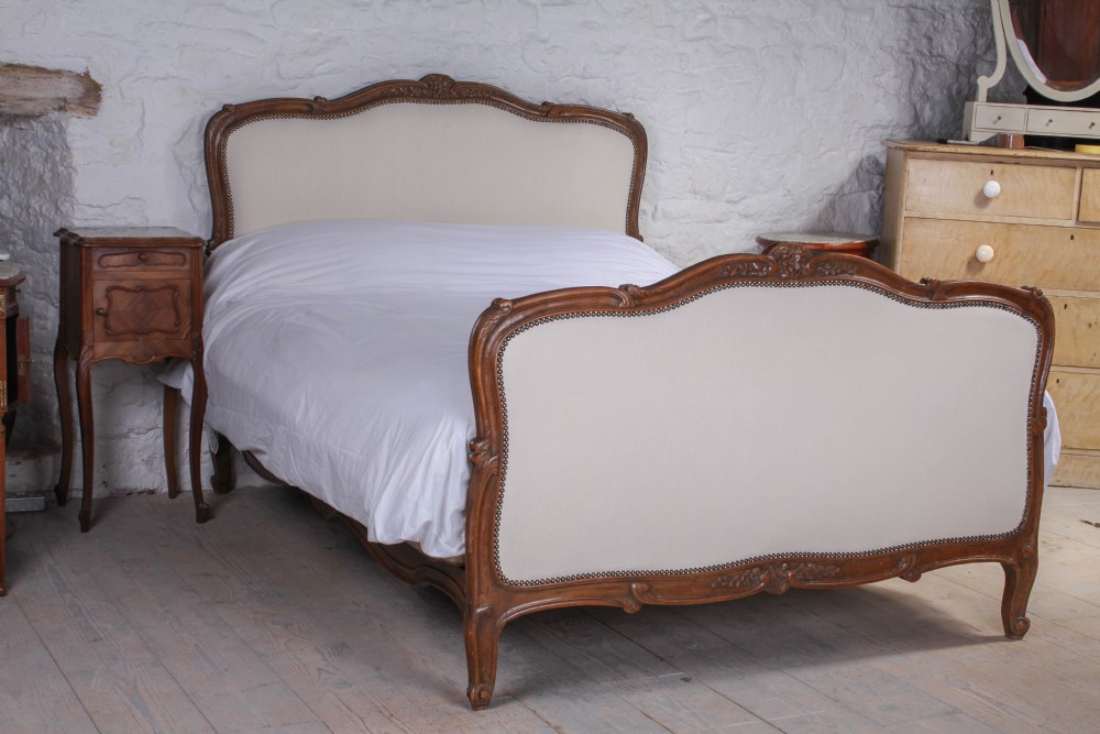 Lovely kingsize French bed newly upholstered 