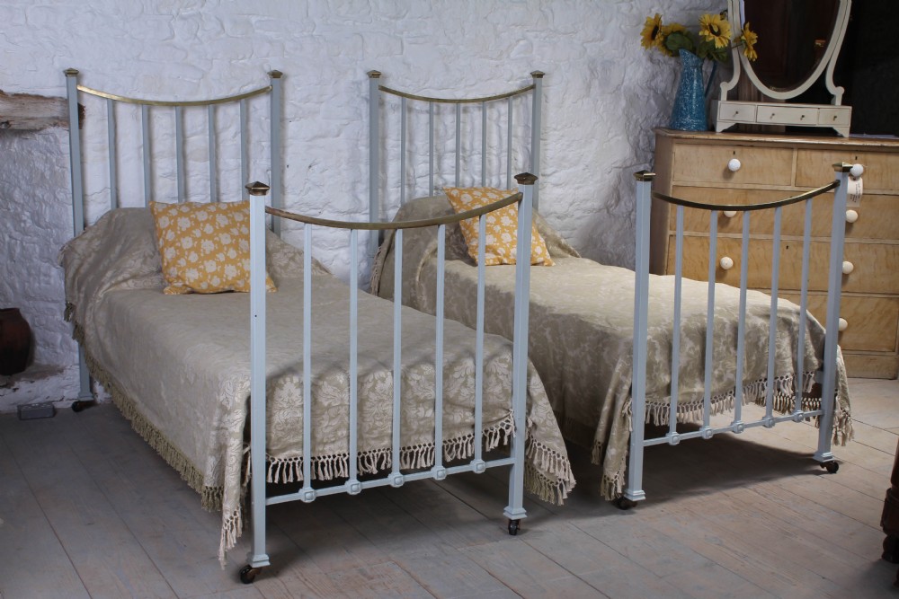 Matching pair of Edwardian brass and iron 