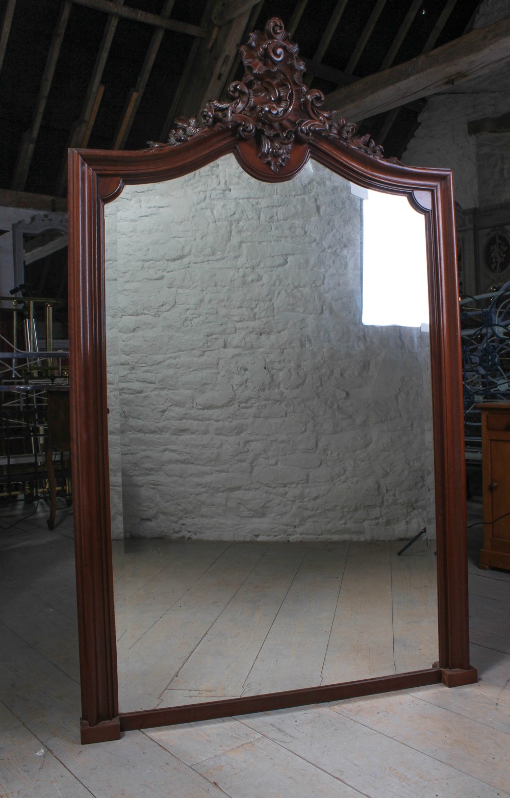 Spectacular carved walnut Louis XV style walnut mirror