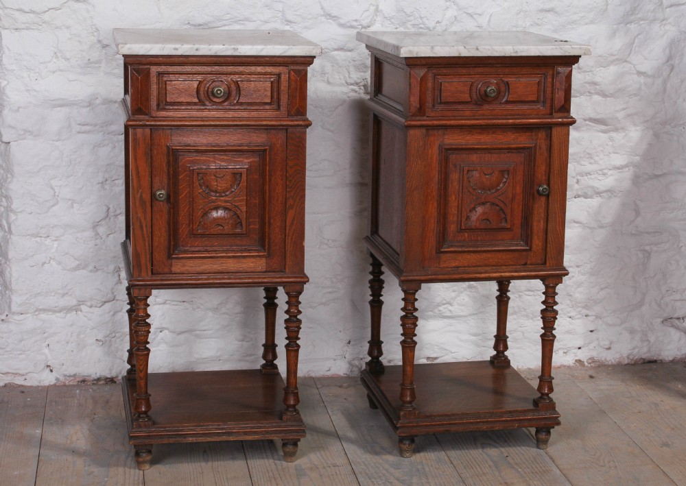 Pair of Gothic oak bedsides with marble tops