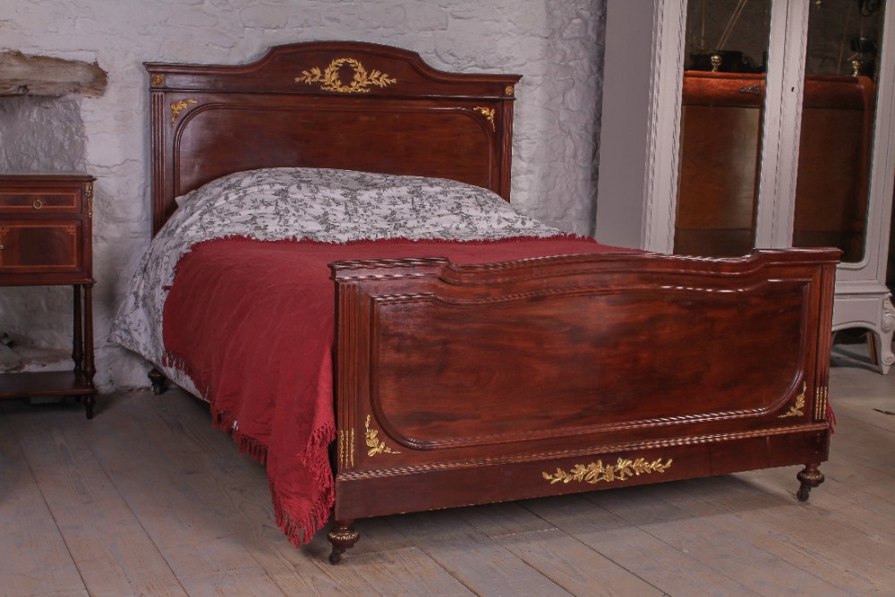 Mahogany king size French bed with gilded bronze mounts