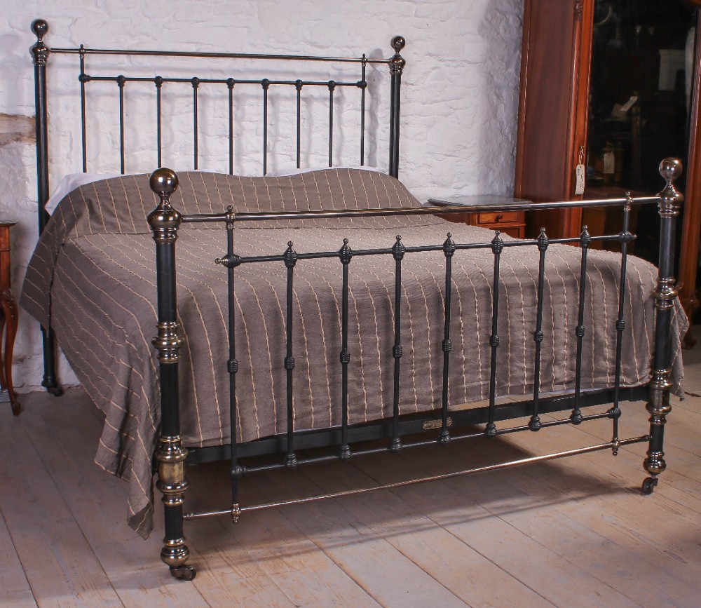 Very handsome 6Ft super king size Victorian black and aged brass bed