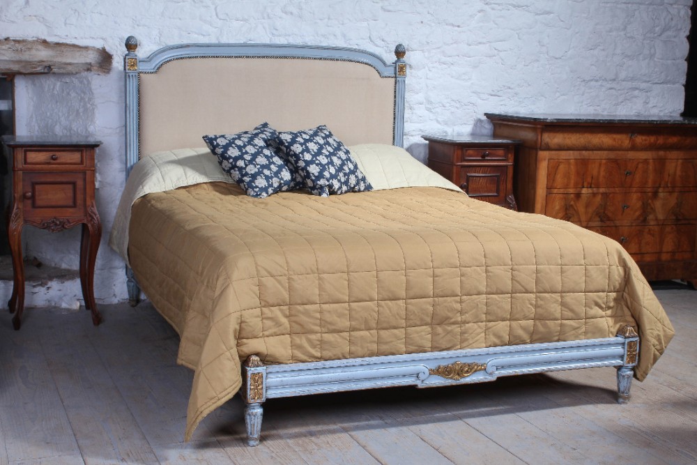 Newly upholstered French painted low low bed