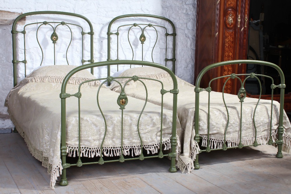 Lovely pair of individual French single iron beds
