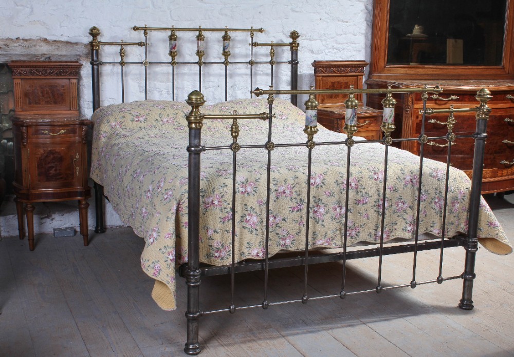 King size 5Ft Victorian burnished iron with aged brass and porcelain detail bed
